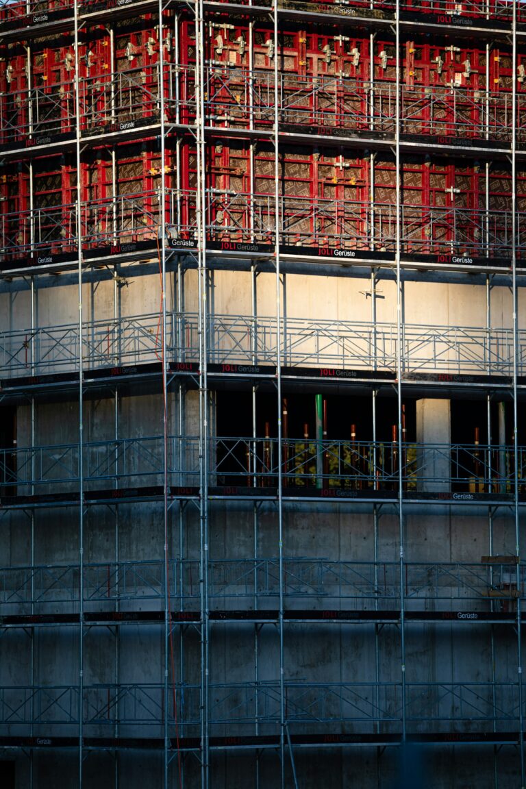 Large building surrounded by scaffolding