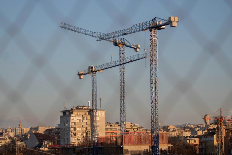 Construction site secured behind a temporary fence